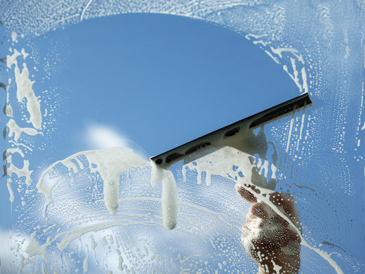 squeegee on a soaping window